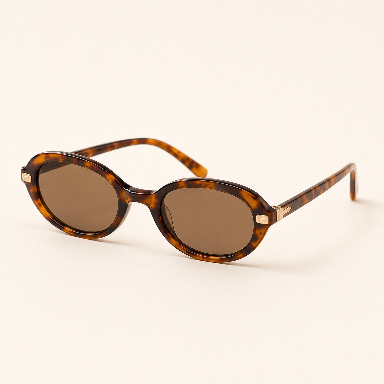 Lunettes ovales ecaille ambre verres fumes